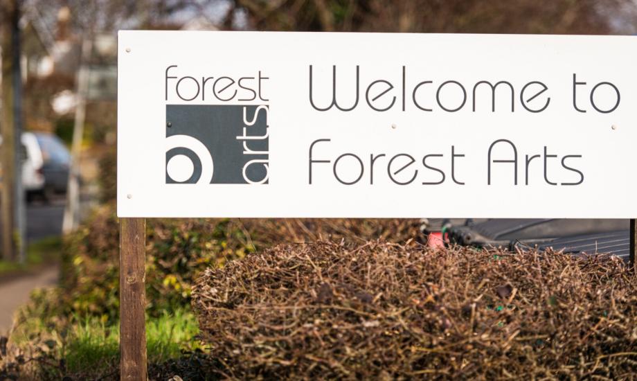 welcome to forest arts sign