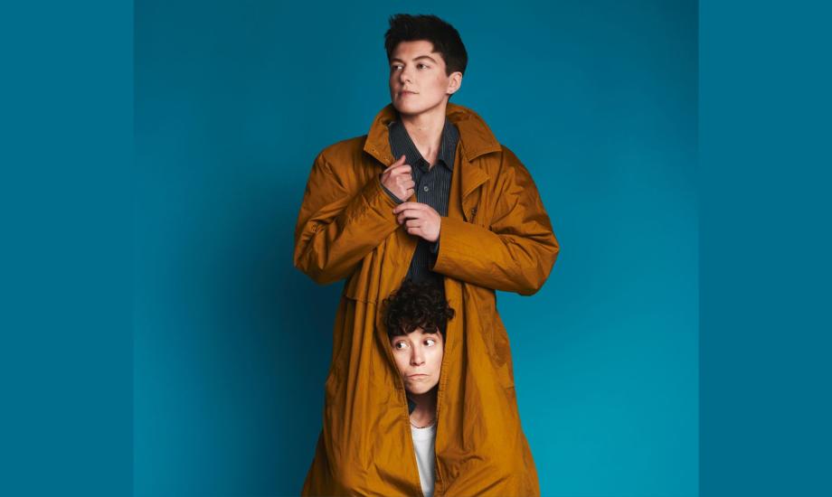 Two people in a coat